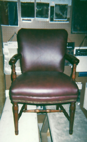 A leather upholstered chair for a customer's study.